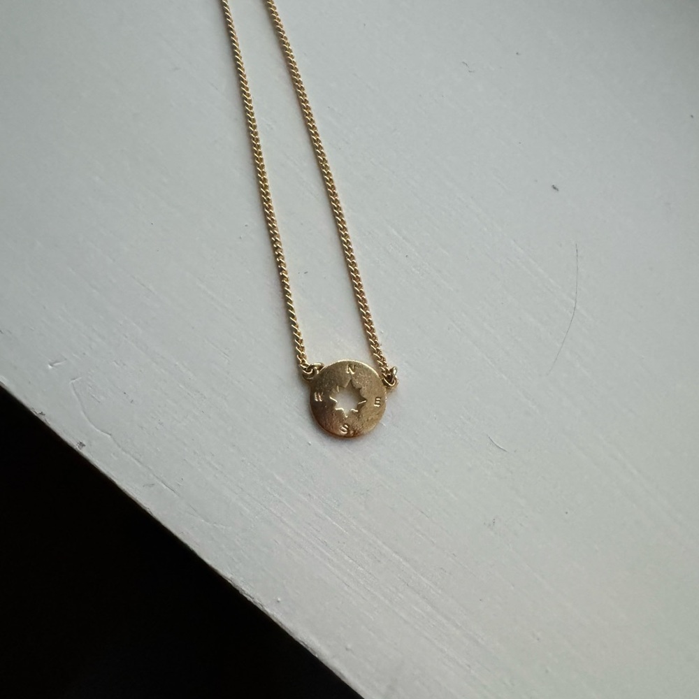 Gold compass necklace